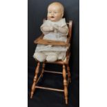 Small baby doll circa 1927 'Happytot' by the 'American Character' company with composition head