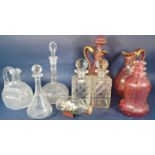 A mixed collection of six cut glass decanters including a pair of square cut , a pair of Venetian