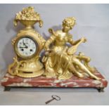 A 19th century French mantle clock, the marble base supporting a clock movement with eight day