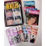 A quantity of Beatles fan magazines dating from the 1970s and 1980s. [1]