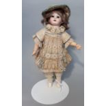 Small German bisque shoulder-head doll (with jointed neck) by Armand Marseille, early 20th