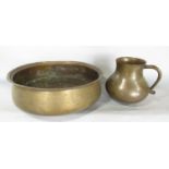 A 19th century beaten and welded brass bowl 38cm diam, and a bronze pot with a handle and a bronze