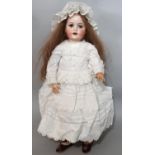 Early 20th century 'Bébé Elité' bisque head doll designed by Max Handwerck and produced by William