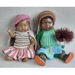 2 small early 20th century painted bisque head black dolls, both with 5 piece composition body,