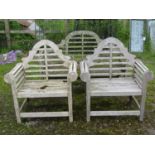 A weathered teak Lutyens style garden bench 166 cm long, together with a pair of accompanying