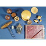 A Victorian leather bound curios register, Victorian corkscrew and a quantity of miniature treen