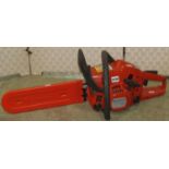 A Husqvarna 236 petrol chainsaw (used) but appears in good condition