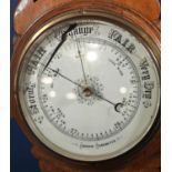Three aneroid barometers, all in oak cases (af all)