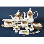 A collection of Royal Albert Old Country Roses comprising teapot, coffee pot, two sugar bowls, two
