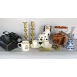 A miscellaneous collection of items including Staffordshire black and white King Charles Spaniel,