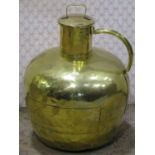 A large polished brass ewer and cover with loop handle, 50cm H