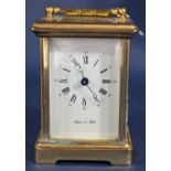 A simple brass carriage clock with eight day timepiece by Mappin & Webb