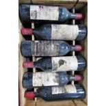 Twelve bottles of 1985 Chateau Bellegrave Listrac Medoc red wine.
