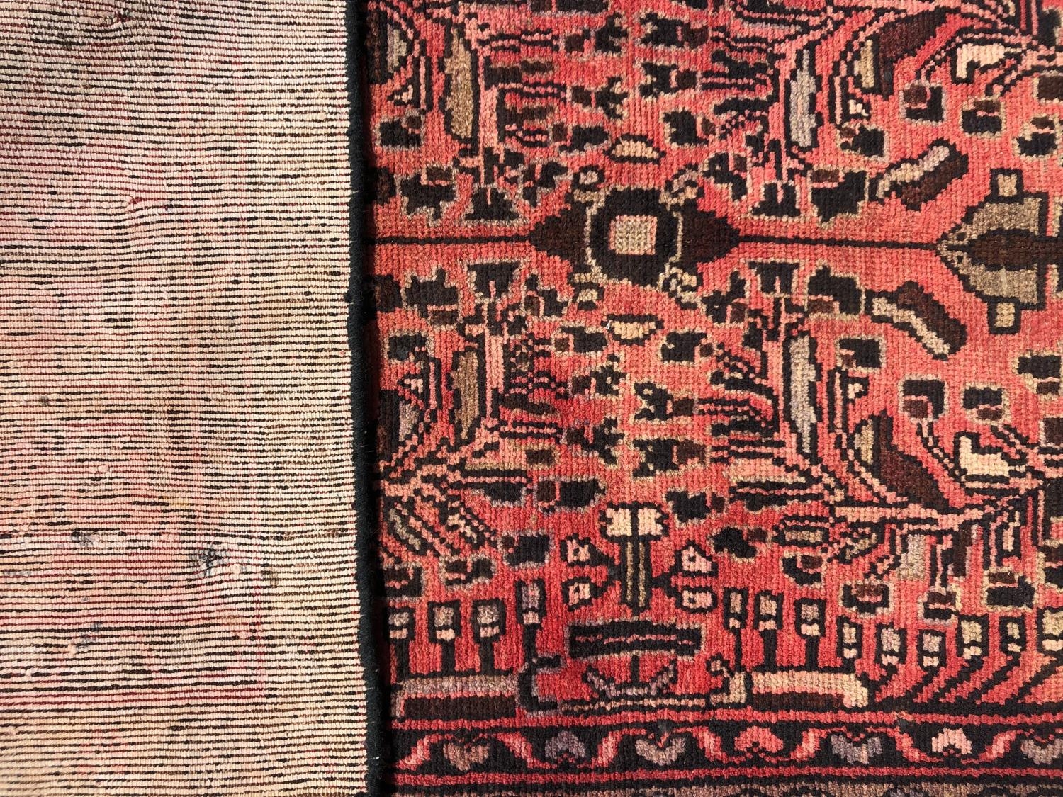 A Hamadan rug with a floral pattern on a rose pink ground. 195cm x 95cm approx - Image 2 of 2