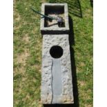 A good quality contemporary two sectional rough hewn carved stone (possibly granite) water feature