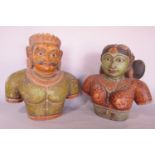 Two polychrome painted Indian busts of a man and a woman in traditional dress. 30cm and 28cm