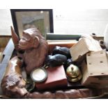 A miscellaneous collection of items including a carved wood chimp, three ebony elephants, a carved