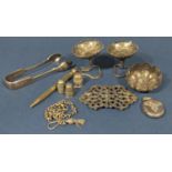 A mixed collection of silver including a buckle, three thimbles, a locket, watch chain and a