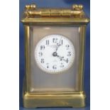 A French carriage clock, the eight day movement with strike action, retailed by The Goldsmiths