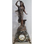 A 19th century French marble mantle clock, the base enclosing an eight day striking movement with