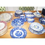 A collection of 19th century blue and white china wares in various designs comprising two large