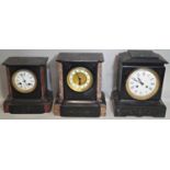 Three Victorian black slate and marble mantle clocks with 30 or eight day striking movements