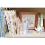 A charming collection of various Beatrix Potter books and associated items including a Peter