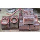 Five vintage cast iron 56 lb weights, two with loose ring handles