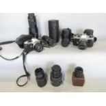 Photographic equipment including, a Pentax Spotmatic camera, with two Takumar lens, a Sigma lens and