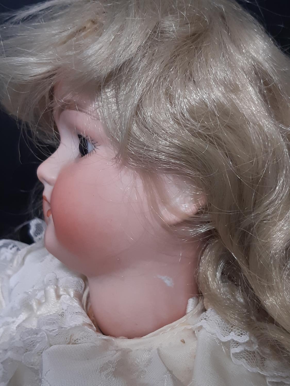 Early 20th century bisque head doll with closing brown eyes, open mouth with teeth and jointed - Image 4 of 7