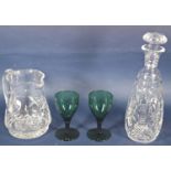 A boxed set of six Edinburgh crystal wine glass, a near matching decanter and water jug and two