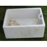 A reclaimed Astra Cast white glazed stoneware butlers sink of rectangular form, approx 60 cm long