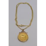 South African 1980 ¼ Krugerrand in 9ct pendant mount, hung on a 9ct flat curb link chain necklace,