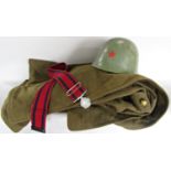 A Dutch Army khaki great coat circa 1950’s a Soviet style army helmet with red star emblem, and a