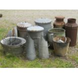 Two vintage weathered heavy gauge milk churns together with a selection of galvanised wares