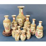 Twelve 19th Century Chinese canton famille rose vases, one on stand: 24 cm (without stand) (12)
