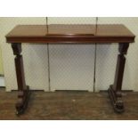 Mid-Victorian mahogany writing or reading table, the stretcher base with adjustable ratchet