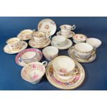A collection of 18th & 19th century tea bowls and tea cups, many with saucers including examples