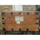 a 19th century pine chest with re-enforced steel fittings, twin lock and drop side carrying handles,