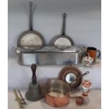A stainless steel salmon poacher, a handbell, Three further vintage cooking pans etc