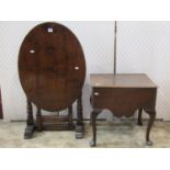 A good quality reproduction Old English style oak oval folding occasional table with gateleg action,