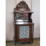 A Victorian walnut and figured walnut veneered bowfronted music cabinet, free standing and