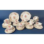A Royal Crown Derby tea set comprising sandwich plates, side plates, cups and saucers, milk jug,
