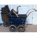 Two vintage dolls' prams by Tri-ang, both with a deep frame, storage compartment under the inner