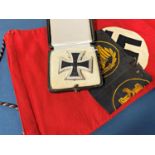 A collection of World War II German military memorabilia, iron cross, (first class) with original