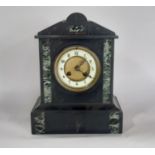 Victorian black slate and marble mantle clock of architectural form with eight day striking