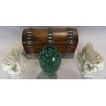 An antique green glass dump, 16cm high big chipped to base, a pair of marble effect lions , a walnut