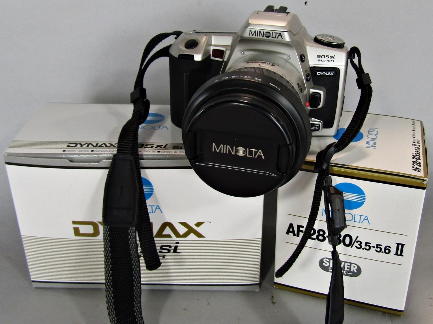 A digital compact Panasonic TZ19 14.1mp outfit, boxed Yasmica EZ zoom 105 and Canon Supershot film - Image 2 of 2