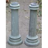 A pair of light green painted cast alloy cylindrical fluted columns/pedestals 70 cm high