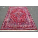A good quality Meshed carpet with a large overall floral design,360cm x 260cm.